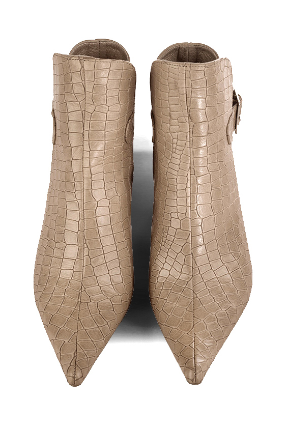 Tan beige women's ankle boots with buckles at the back. Pointed toe. High slim heel. Top view - Florence KOOIJMAN